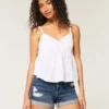 High-Rise Ripped Dark Wash Denim Shortie Shorts High-Rise Ripped Dark Wash Denim Shortie Shorts