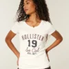 Holiday Vault Release Logo Graphic Tee Holiday Vault Release Logo Graphic Tee