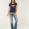 Holiday Vault Release Logo Graphic Tee Holiday Vault Release Logo Graphic Tee