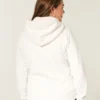 Holiday Vault Release Sherpa-Lined Zip-Up Logo Graphic Hoodie Holiday Vault Release Sherpa-Lined Zip-Up Logo Graphic Hoodie