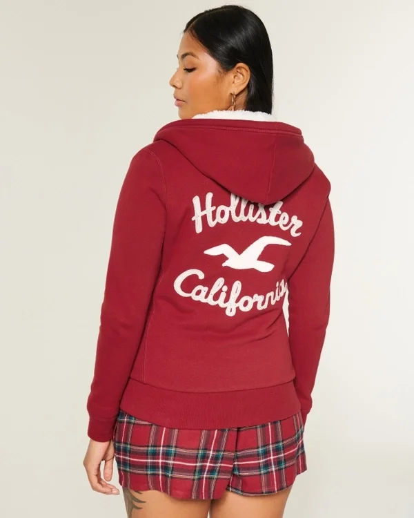 Holiday Vault Release Sherpa-Lined Zip-Up Logo Graphic Hoodie Holiday Vault Release Sherpa-Lined Zip-Up Logo Graphic Hoodie
