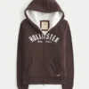 Holiday Vault Release Sherpa-Lined Zip-Up Logo Graphic Hoodie Holiday Vault Release Sherpa-Lined Zip-Up Logo Graphic Hoodie
