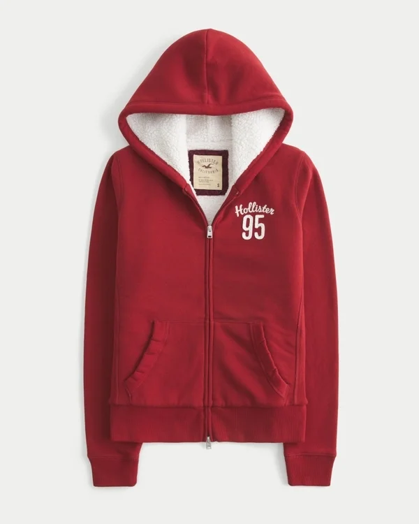 Holiday Vault Release Sherpa-Lined Zip-Up Logo Graphic Hoodie Holiday Vault Release Sherpa-Lined Zip-Up Logo Graphic Hoodie