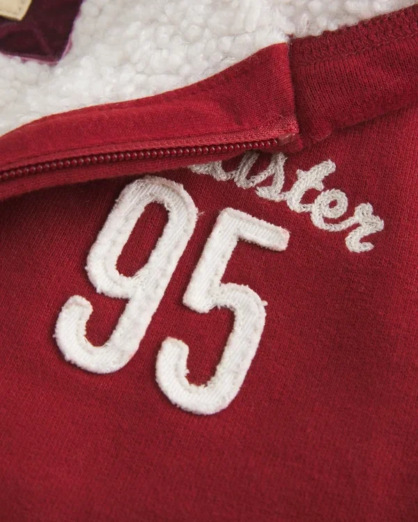 Holiday Vault Release Sherpa-Lined Zip-Up Logo Graphic Hoodie Holiday Vault Release Sherpa-Lined Zip-Up Logo Graphic Hoodie