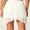 Lace Asymmetrical Hem Mini Skirt