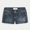 Low-Rise Dark Wash Embroidered Denim Shortie Shorts Low-Rise Dark Wash Embroidered Denim Shortie Shorts