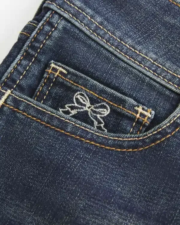 Low-Rise Dark Wash Embroidered Denim Shortie Shorts Low-Rise Dark Wash Embroidered Denim Shortie Shorts