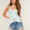 Low-Rise Distressed Medium Wash Denim Mini Shorts Low-Rise Distressed Medium Wash Denim Mini Shorts