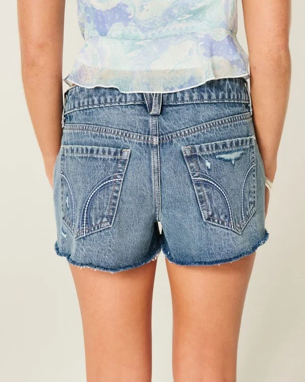 Low-Rise Distressed Medium Wash Denim Mini Shorts Low-Rise Distressed Medium Wash Denim Mini Shorts