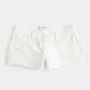 Low-Rise Distressed White Denim Mini Shorts