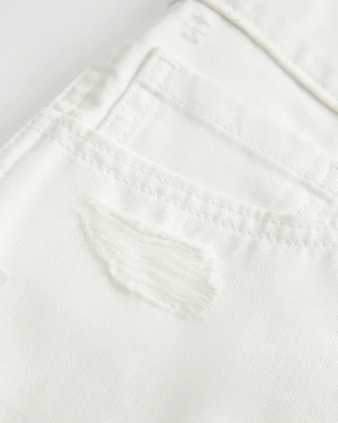 Low-Rise Distressed White Denim Mini Shorts