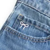 Low-Rise Embroidered Bow Denim Mini Skort