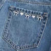 Low-Rise Embroidered Bow Denim Mini Skort