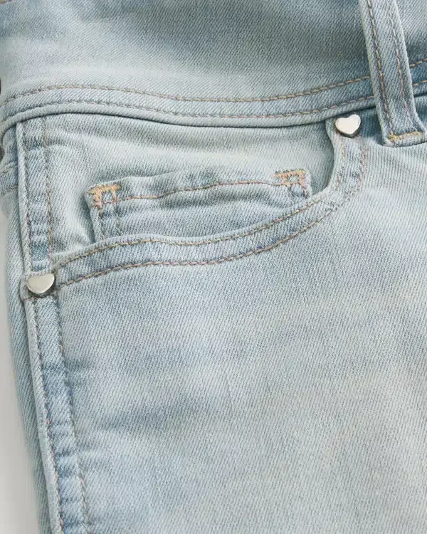 Low-Rise Light Wash Denim Shortie Shorts Low-Rise Light Wash Denim Shortie Shorts