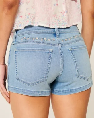 Low-Rise Light Wash Floral Embroidered Denim Shortie Shorts