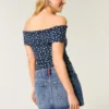 Low-Rise Medium Wash Flag Embroidered Denim Mini Skort