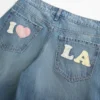 Low-Rise Medium Wash Los Angeles Graphic Baggy Jeans Low-Rise Medium Wash Los Angeles Graphic Baggy Jeans