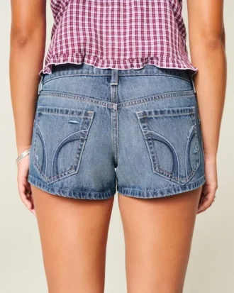 Ultra Low-Rise Distressed Medium Wash Denim Mini Shorts