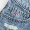 Ultra Low-Rise Embroidered Denim Mini Shorts Ultra Low-Rise Embroidered Denim Mini Shorts