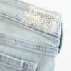 Ultra Low-Rise Light Wash Let-Down Hem Flare Jeans