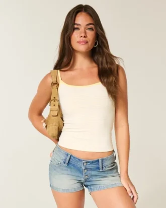 Ultra Low-Rise Medium Wash Denim Shortie Shorts