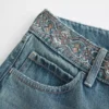 Ultra Low-Rise Medium Wash Embroidered Waist Baggy Jeans