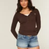 Ultra Low-Rise Medium Wash Floral Embroidered Denim Mini Shorts Ultra Low-Rise Medium Wash Floral Embroidered Denim Mini Shorts